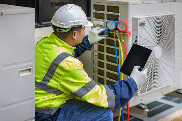 Professional Air Conditioning Repair technician working in Concord, NH